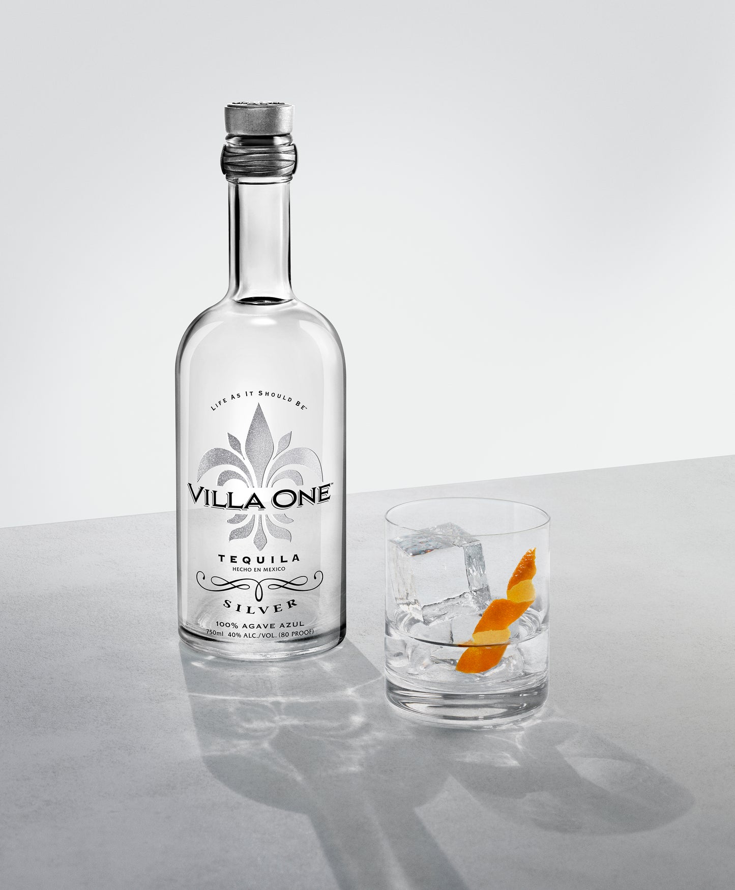 Villa One Tequila Silver bottle next to a cocktail glass